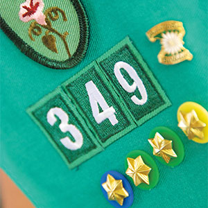 Patches on a girlscout vest