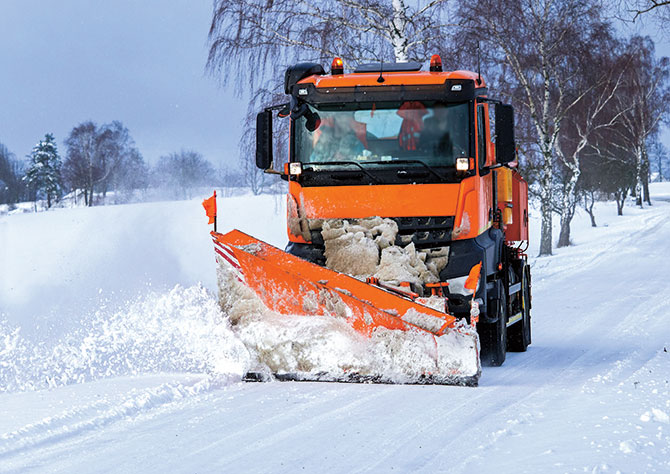 A snowplow moving snow