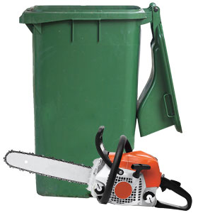 A chainsaw next to a garbage